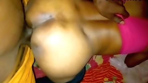 A slutty brunette gives a blowjob to her friend's dick