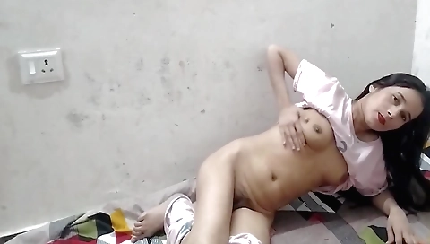 Busty brunette in short sexy dress naked and masturbates