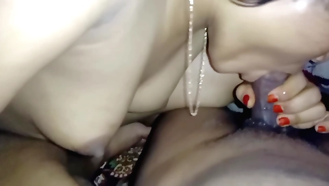 Indian girl is making out with her man on the couch