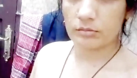 Indian housewife is naked on the bed and shows off her body