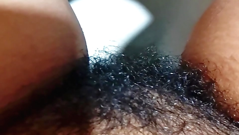 Hairy babe masturbating in the bathroom with a piece of water