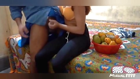 Stunning brunette babe giving a handjob on a big dick