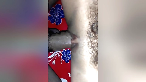 Indian babe in a red dress and hairy bush on the desk