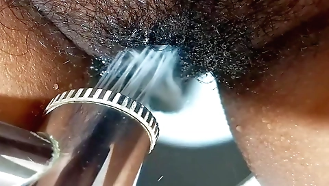 Hairy indian slut is doing solo porn in the bathroom