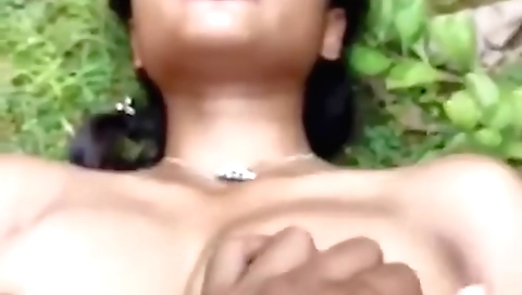 Indian girl with big tits and a sexy ass fucks outdoors