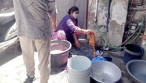 Indian woman rides her boyfriend in the bathroom outdoors