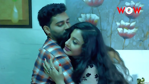 Brunette milf in pink blouse is playing with her hands