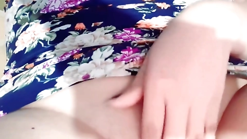 Indian girl in a sexy white dress is masturbating solo