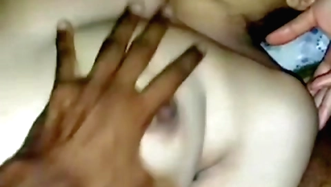 A hot brunette indian shows off her body and looks cute