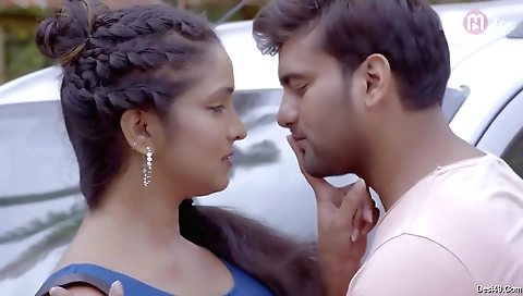 Brunette gym teacher gets on top of a dumbbell machine