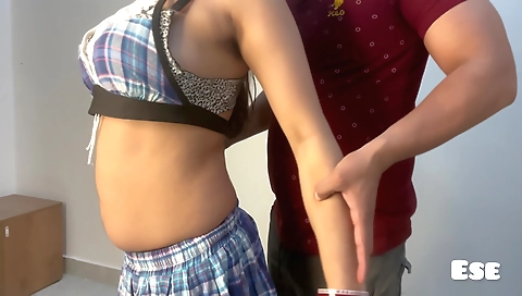 Gym trainer in a nude bikini and bodyweight exercises