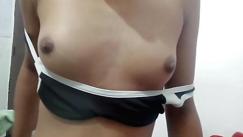 Indian girl enjoys drinking and eating hot curry in bed