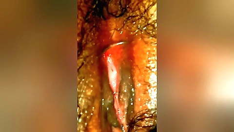 Hairy amateur babe is naked in bedroom and plays with her body