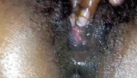 Horny Indian slut with hairy pussy rides a homemade toy