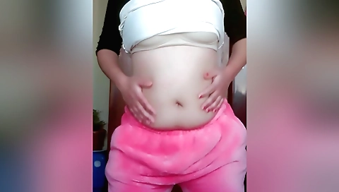 Busty chick in sexy dress is masturbating on webcam