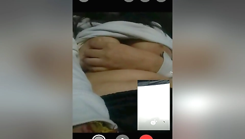 Brunette brunette girl in a red dress and stockings