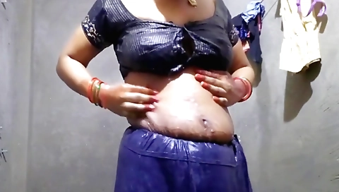 Amateur indian woman takes care of her pussy while naked