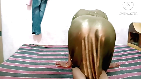 Solo female masturbating and fingering herself in bed