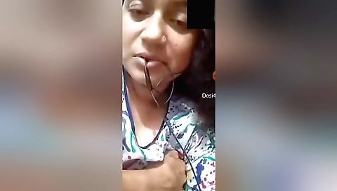 Boudi shows her shaved pussy and tits on the web cam