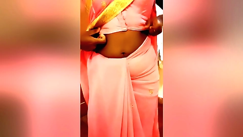Busty indian babe in a solo video is showing off her body