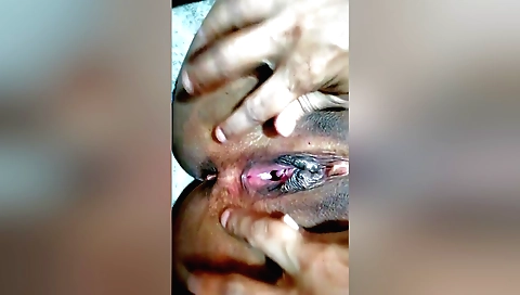 Indian girl sucking her husband's pecker on the bed