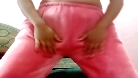 I am masturbating in my bed with a vibrator and dildo