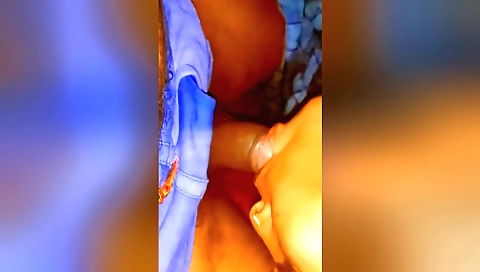 Indian brunette with natural beauty is playing with a piece of meat