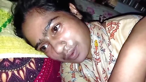 Girl with a sexy face and a sexy body is lying on a table