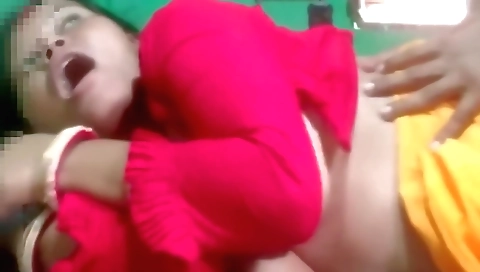 Big boobs of a brunette in a blouse dancing for web cam